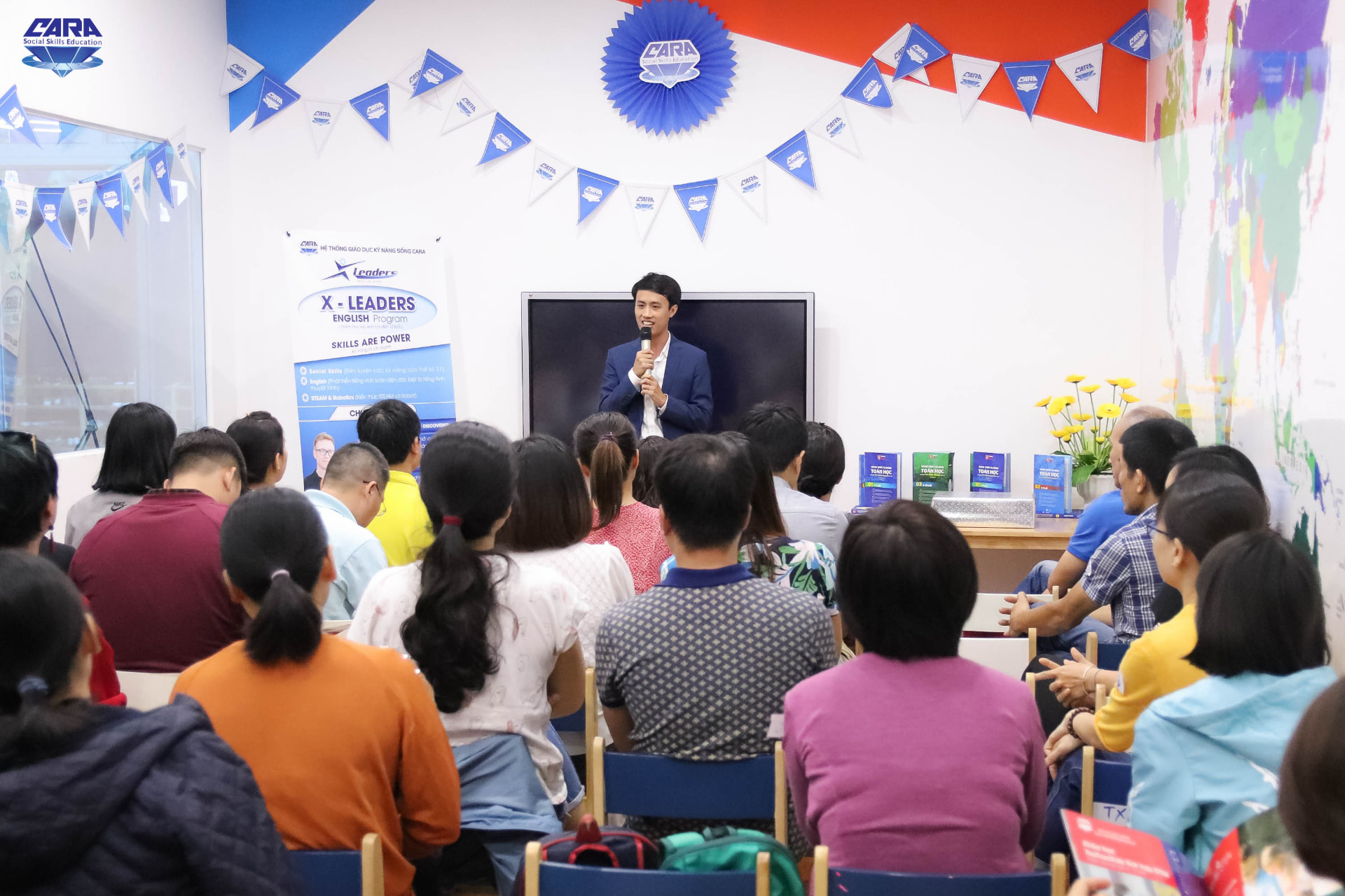 Alex Phuong speaking at an event